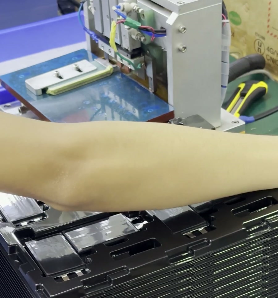 A battery production workstation at the factory